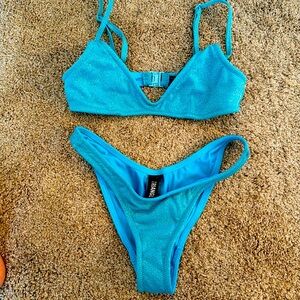 Triangl blue sparkly swimsuit top and bottom size xxs worn once then outgrew